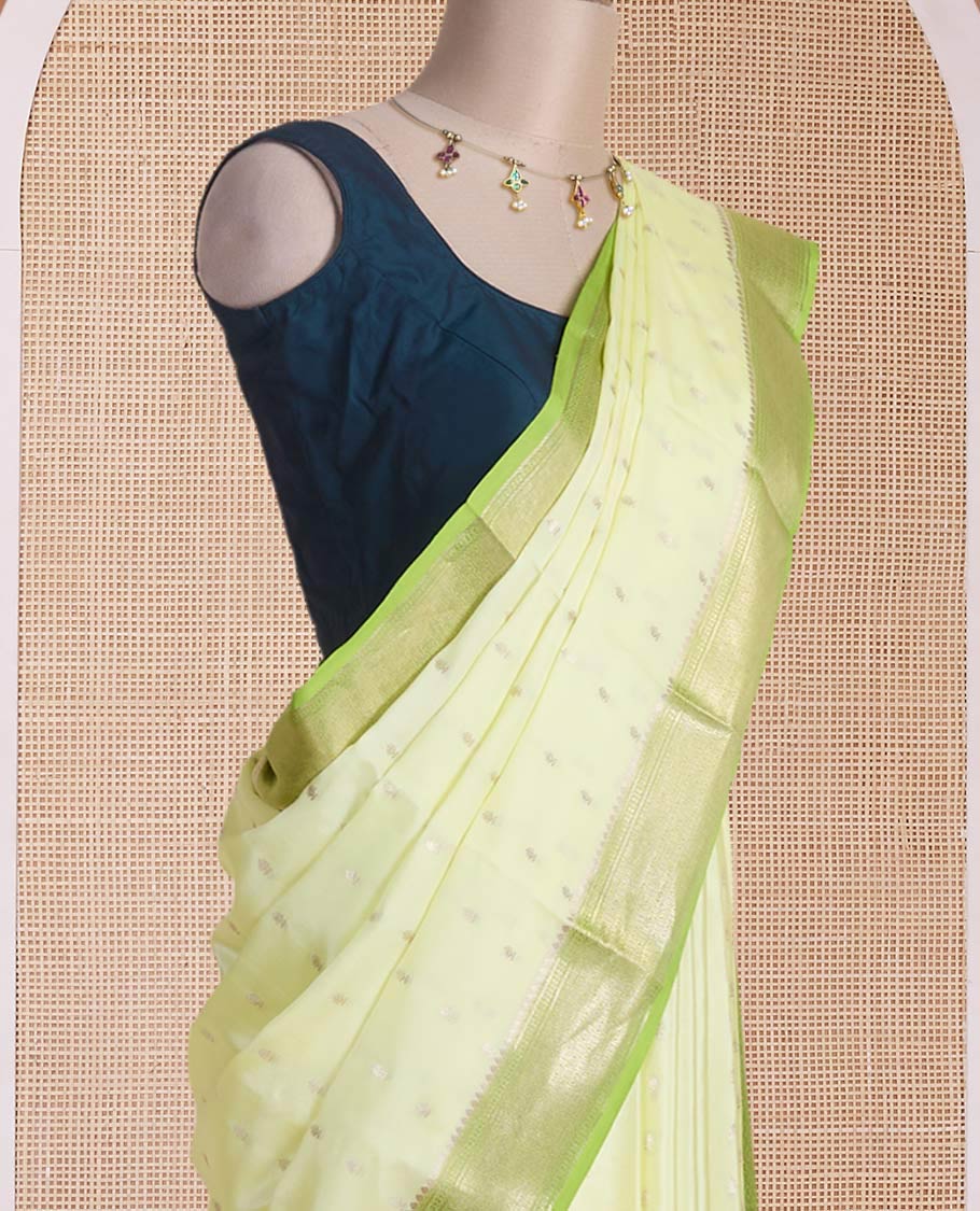 Green zari buttas & corner paisley buttas Mysore silk saree,contrast traditional zari border & paisley butta enclosed checked pallu