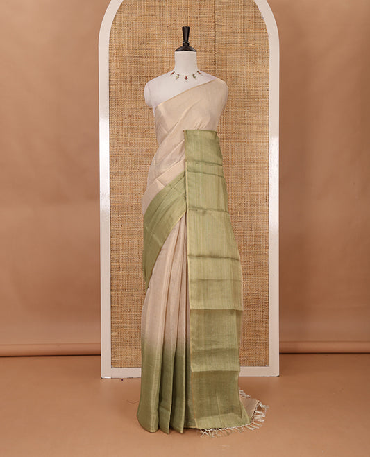 Borderless sandal-light green plain ombre-colored tissue saree, plain pallu & circle motifs printed blouse
