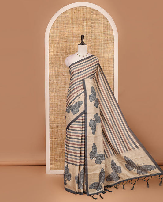 Green horizontal stripes printed soft tussar saree adorned with big butterfly motifs printed border and pallu, contrast blouse