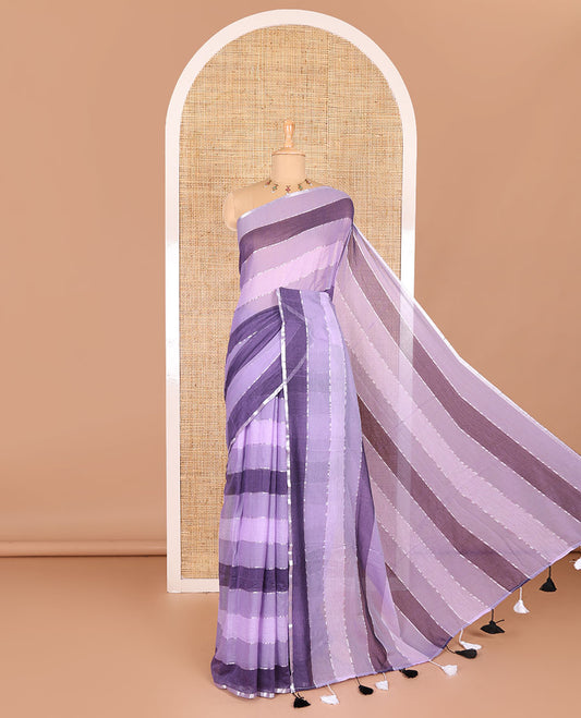 Violet ombre-colored striped khadi mul cotton saree, zari piping border, striped pallu, and a matching striped blouse