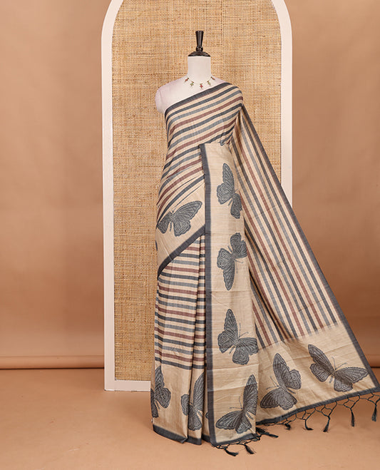 Green horizontal stripes printed soft tussar saree adorned with big butterfly motifs printed border and pallu, contrast blouse