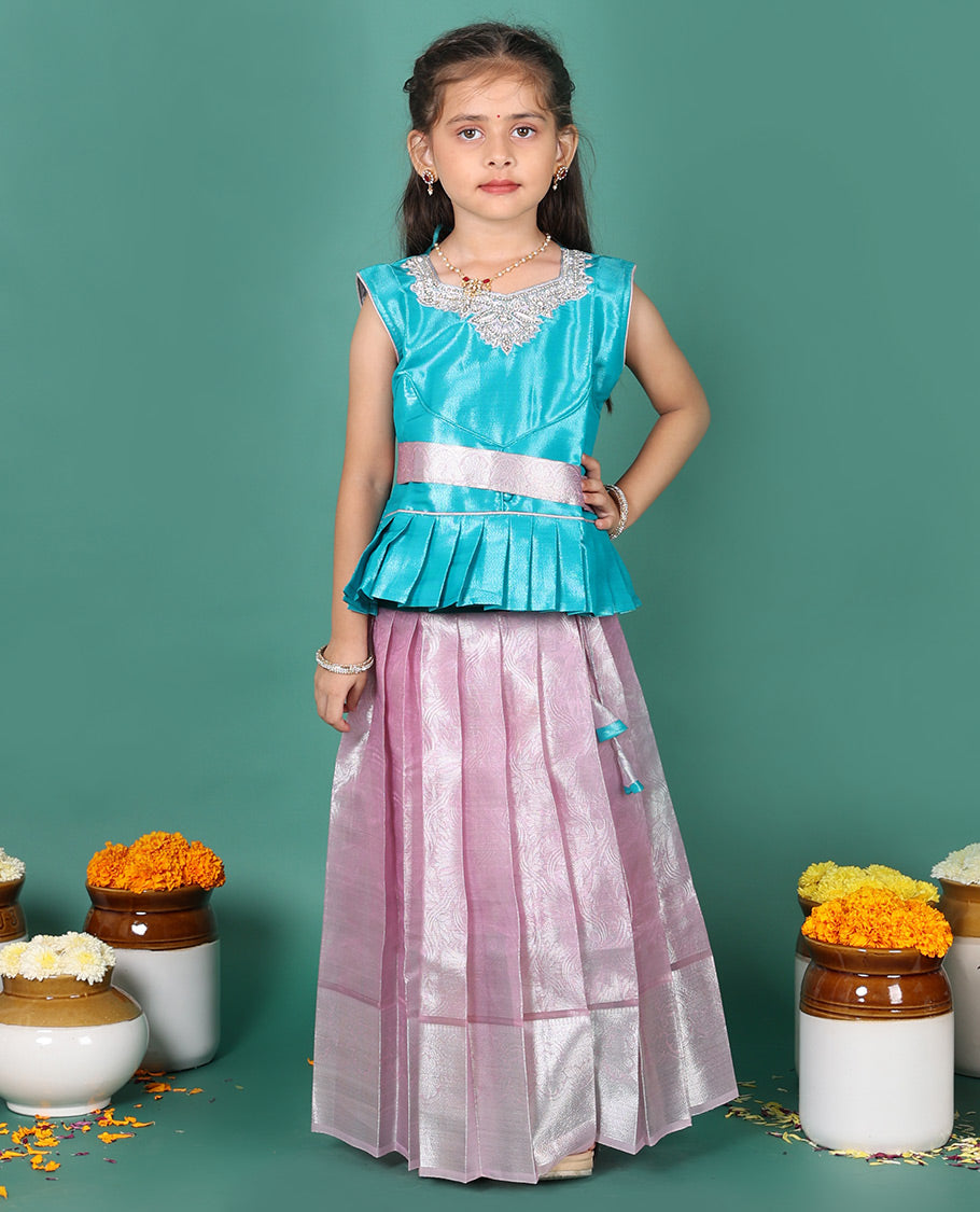Pink readymade art silk pavadai, jacquard & traditional zari border skirt, & embroidered sleeveless round-neck blouse with contrast zari work belt