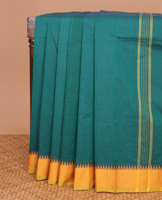 Bottle green plain Chettinad cotton saree, contrast temple thread border & striped pallu