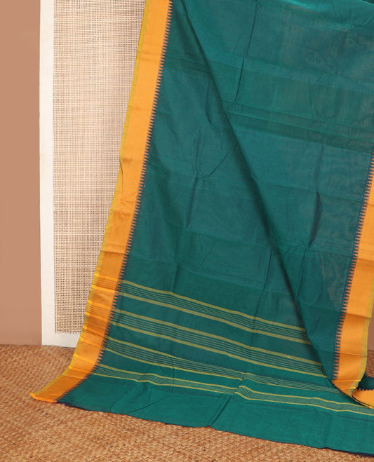 Bottle green plain Chettinad cotton saree, contrast temple thread border & striped pallu