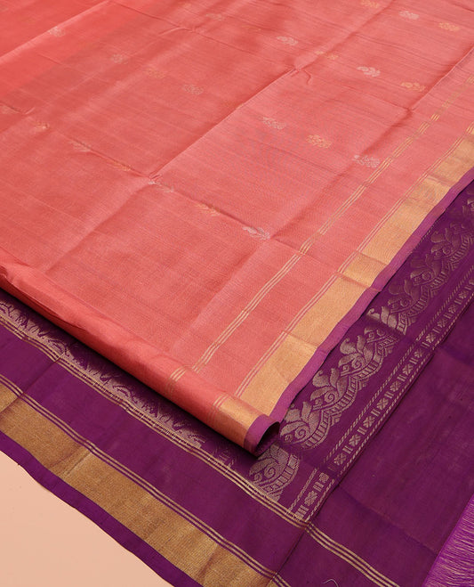 Peach Uppada Silk Saree, Enthralled with Zari Buttas on Its Body, Subtly Sparkled Zari Border, Complemented by a Contrast Pallu Depicting Intricate Design Weave, and Paired with a Contrast Blouse