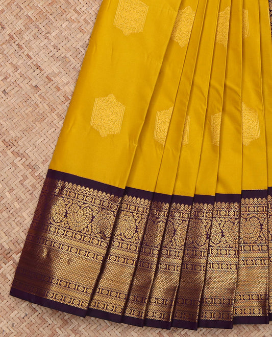 Yellow Budget Silk Saree, Subtly Sparkled with Zari Buttas All Over Its Body, Complemented by a Contrast Traditional Zari Design Border of Floral Creeper Designs, a Grand Pallu of Jaal Design, and Paired with a Contrast Blouse