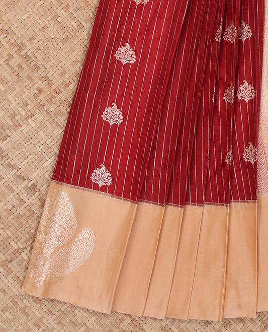 Red Budget Silk Saree, Gleamed Up with Zari Buttas and Stripes, Complemented by a Contrast Zari Motif Border, Intricate Pallu, and a Contrast Blouse