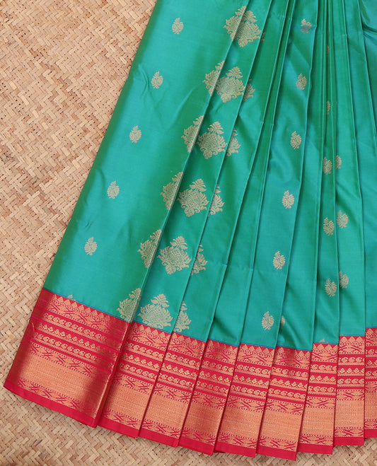 Green Budget Silk Saree, Embellished with Zari Buttas, a Contrast Traditional Zari Border, Intricate Pallu, and a Contrast Blouse