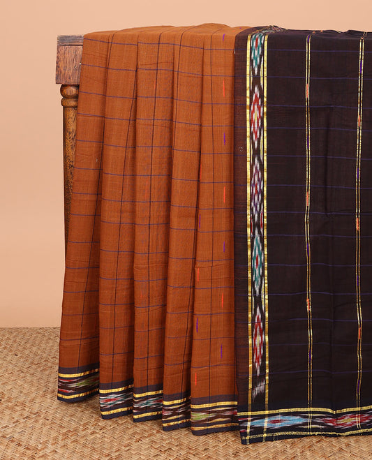 Brown buttas enclosed checked Andhra cotton saree, contrast ikkat border, and pallu of stripes and ikkat design