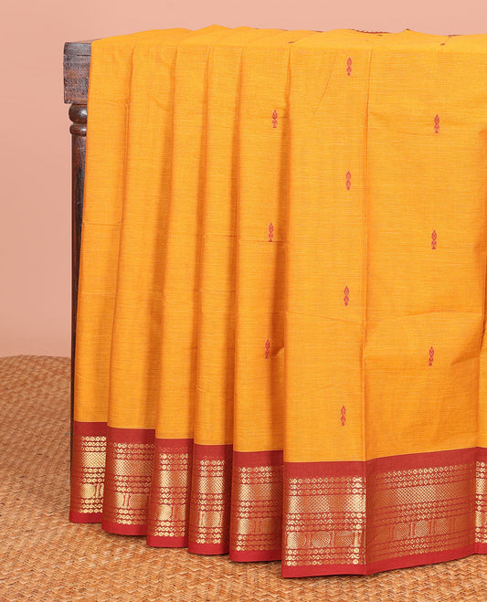 Yellow Chettinad Cotton Saree Beautified with Thread Buttas All Over Its Body, Complemented by a Contrast Traditional Zari Design Border, and a Pallu of Stripes and Buttas