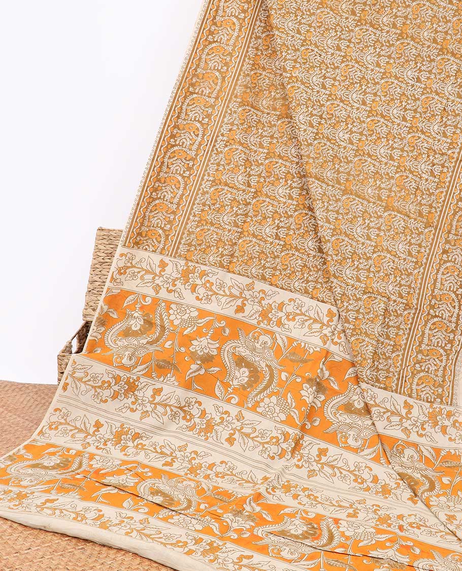 Yellow floral design machine-printed kalamkari cotton saree with contrast floral border & intricate floral design pallu