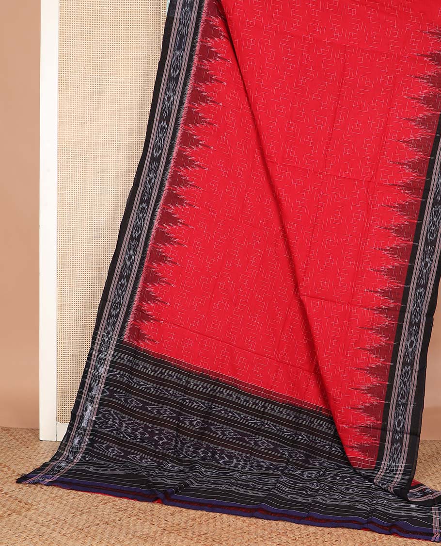 Red geometric maze style ikkat cotton saree, contrast black ikkat border, and pallu of ikkat weave