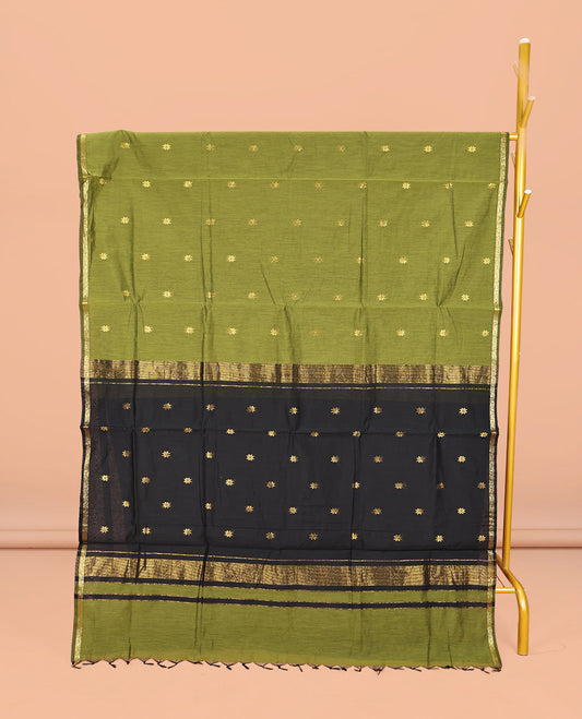 Green Maheshwari Cotton Saree, Beautified with Buttas All Over Its Body, Subtle Zari Piping Border, Complemented by a Contrast Pallu Steeped with Buttas, and Paired with a Contrast Blouse