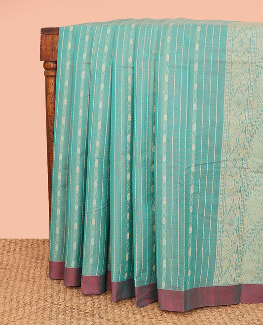 Green Kanchi Cotton Saree, Graced with Thread Stripes All Over Its Body, Complemented by Contrast Border, Pallu Featuring Geometric Designs, and Paired with a Matching Blouse