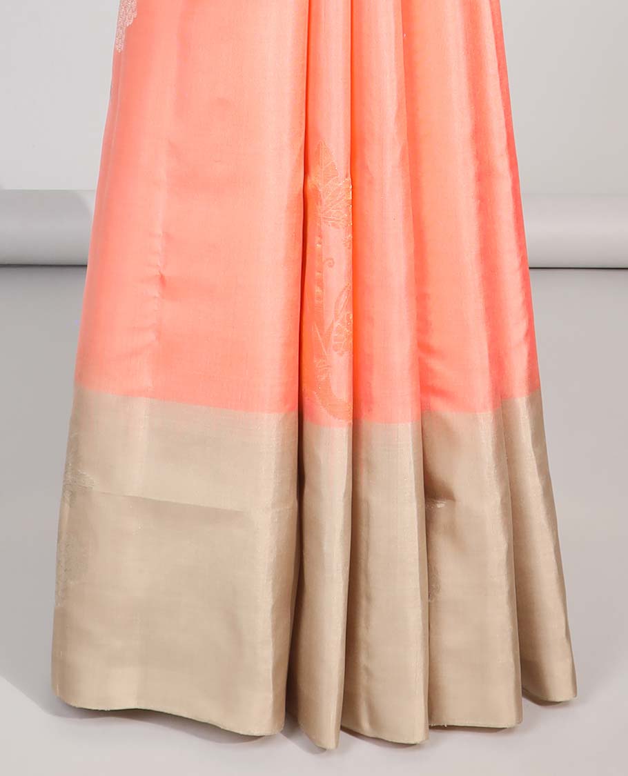 Peach floral buttas soft silk saree with contrast floral border & round buttas pallu