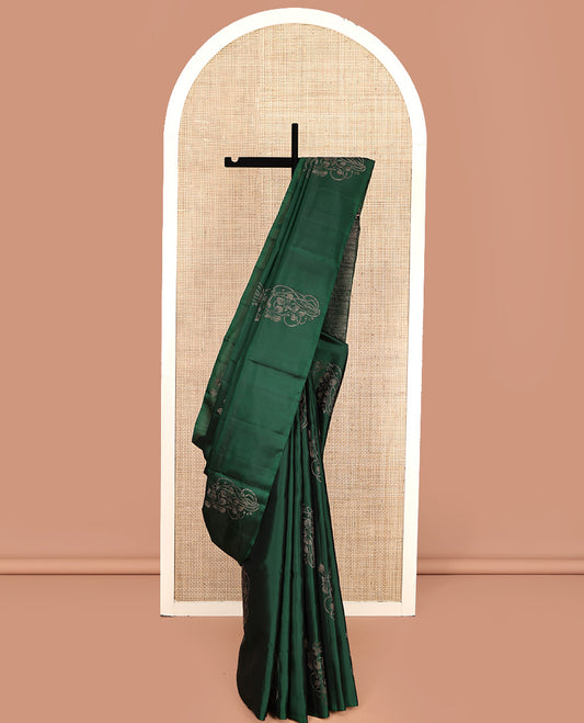 Borderless Green Mayuri Soft Silk Saree, Elevated with Buttas All Over Its Body, a Sparsely Sparkled Self-Pallu, and Paired with a Matching Blouse