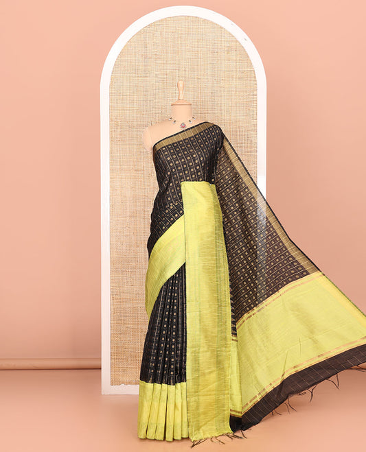 Black polka dot butta enclosed checked semi-raw silk saree, contrast traditional zari design border, contrast diamond patterned pallu, and a contrast blouse