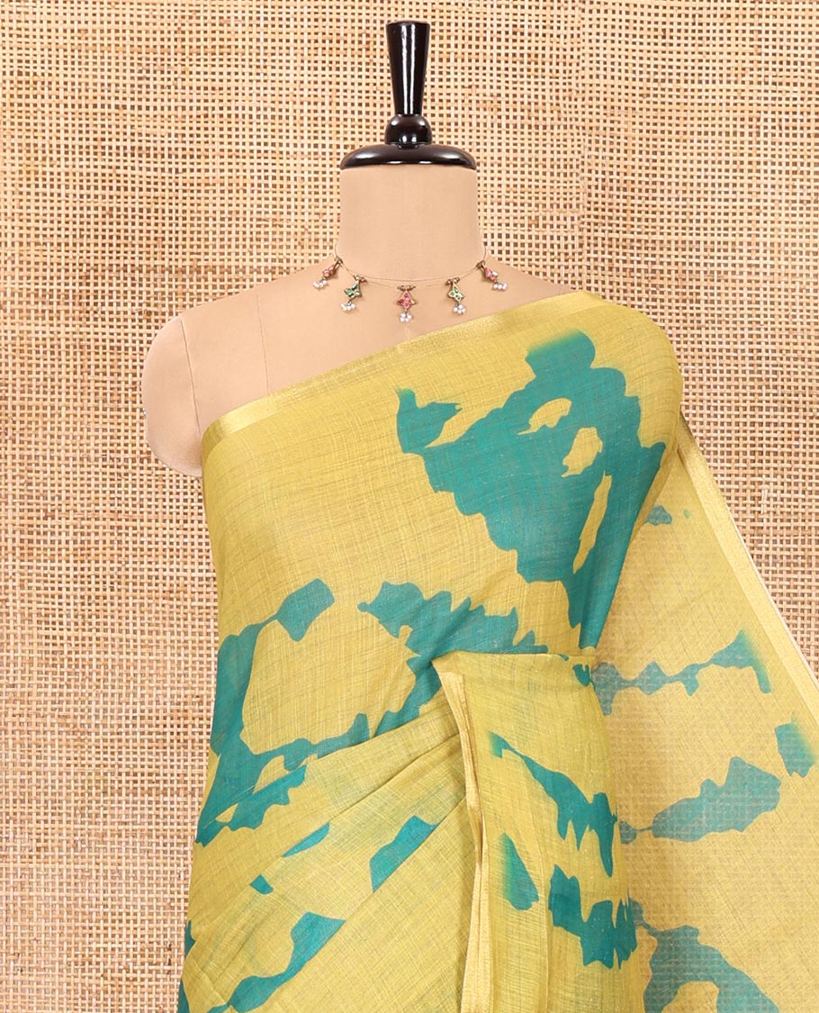 Parrot green shibori printed linen cotton saree, piping border, contrast floral printed pallu, and a contrast floral printed blouse