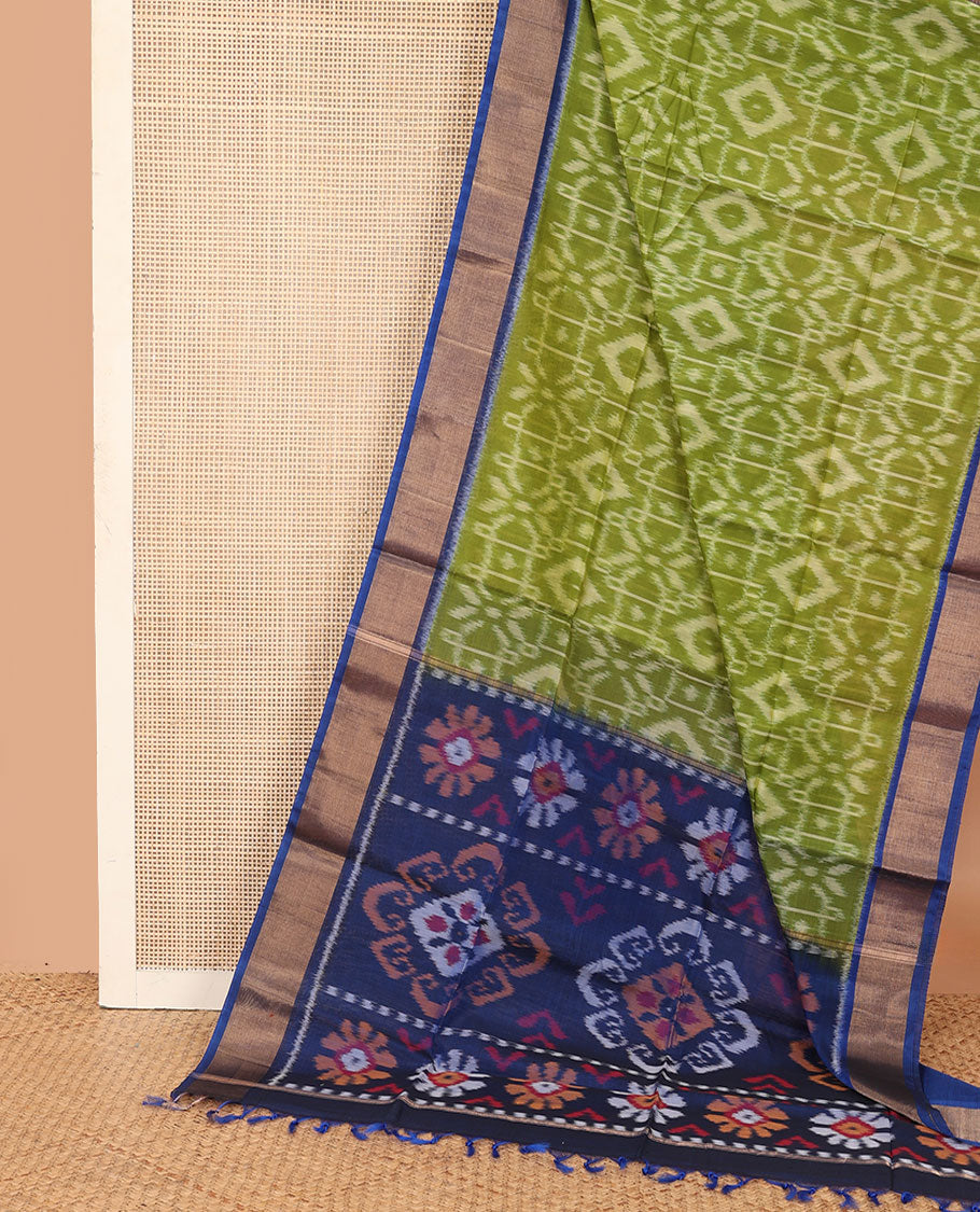 Green ikkat design silk cotton saree, contrast bavanji border, and pallu of ikkat designs