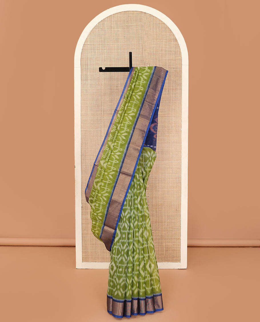 Green ikkat design silk cotton saree, contrast bavanji border, and pallu of ikkat designs