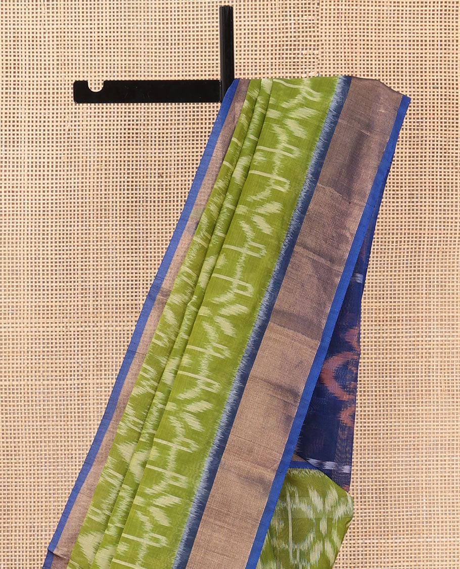 Green ikkat design silk cotton saree, contrast bavanji border, and pallu of ikkat designs