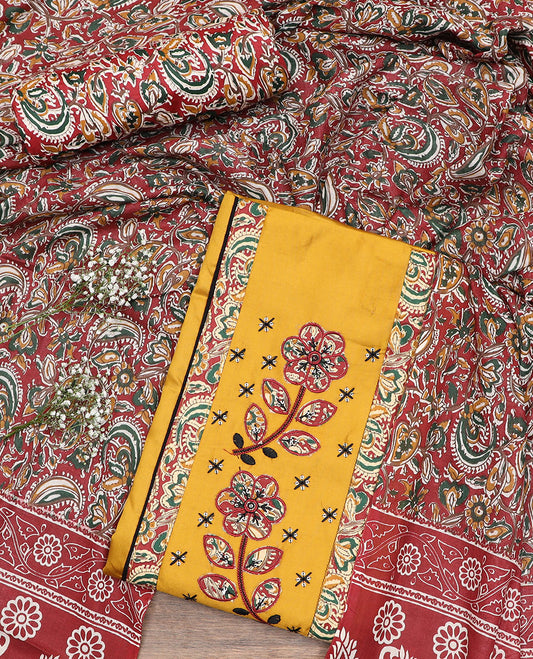 Yellow material chudidar set,  neck embroidered top, contrast bottom and dupatta of kalamkari style floral-paisley vine