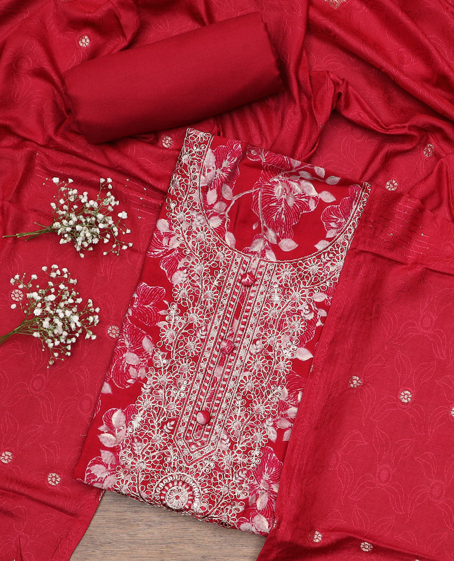 Red material chudidar set, floral print with neck embroidered top, plain bottom and printed duppata of flower buttas