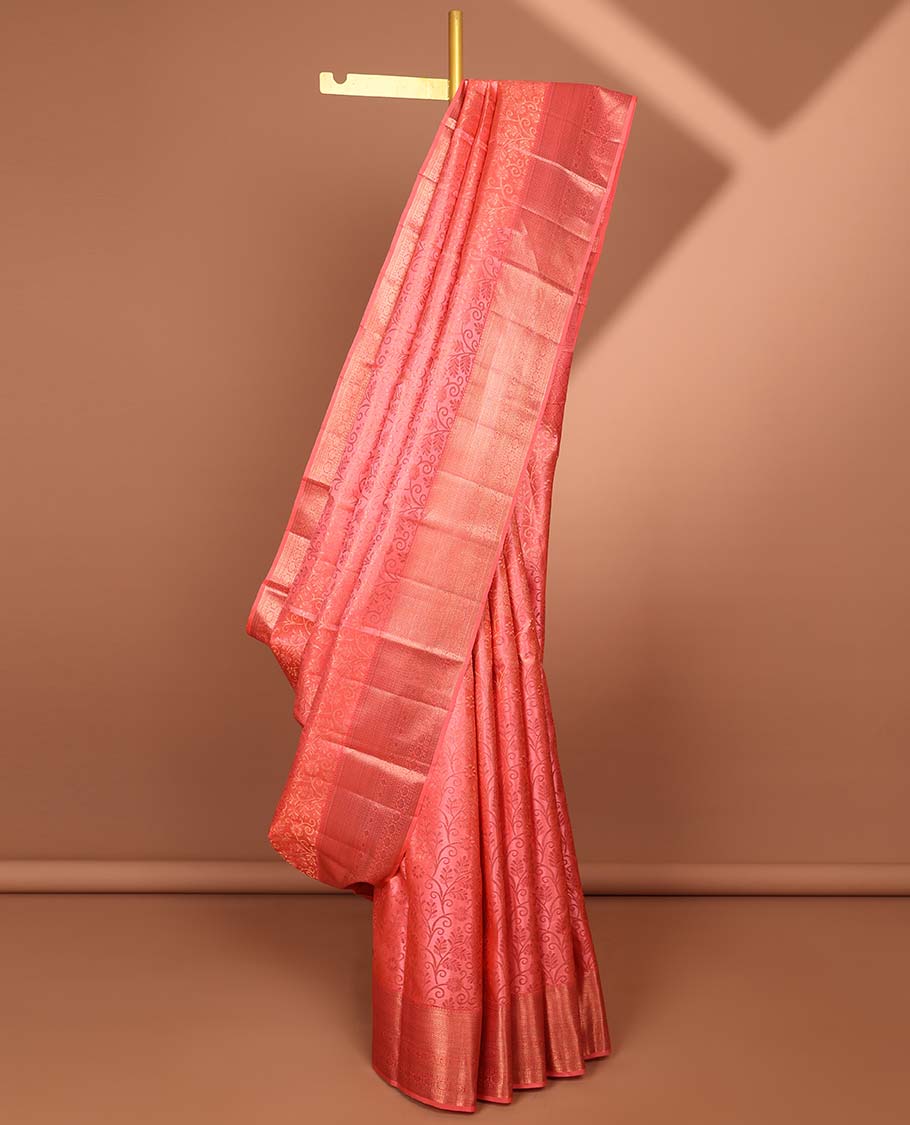 Peach floral jacquard kancheepuram silk saree with contrast checked zari border & intricate zari design pallu