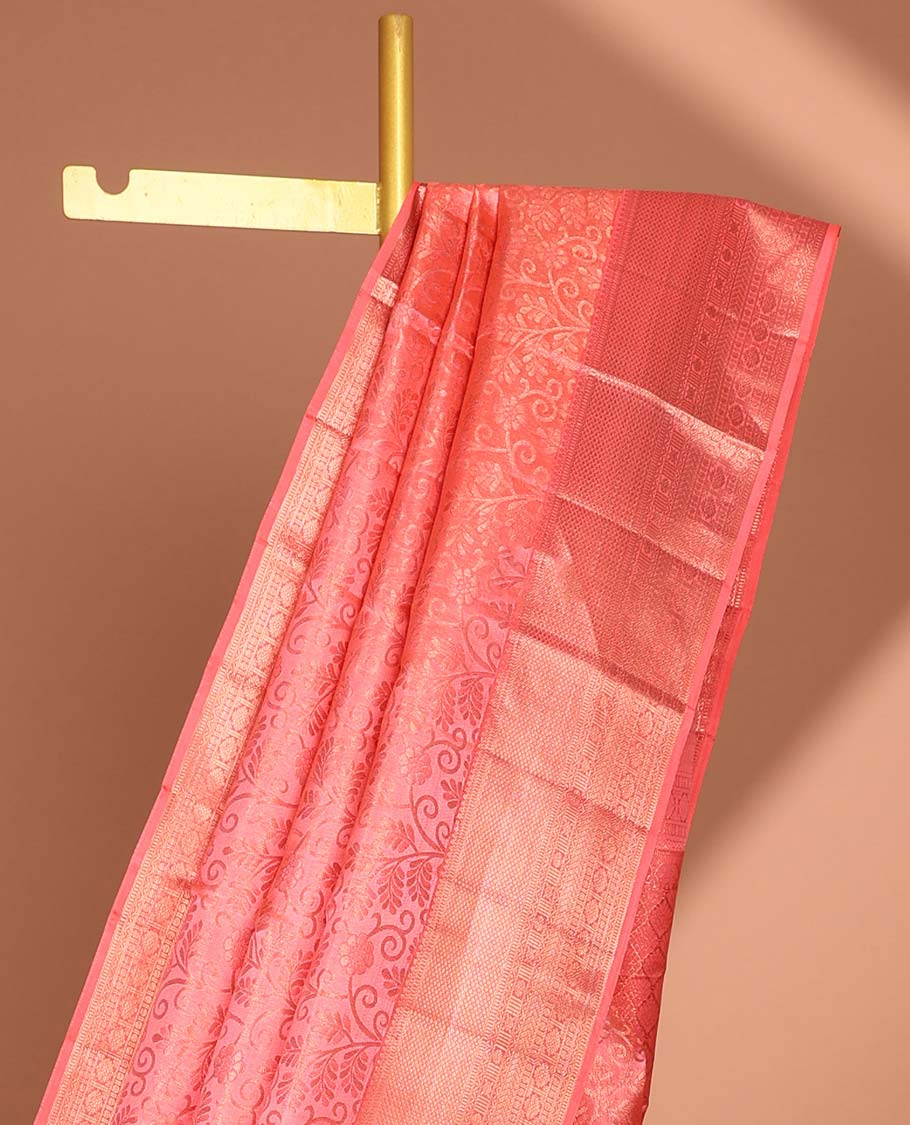 Peach floral jacquard kancheepuram silk saree with contrast checked zari border & intricate zari design pallu
