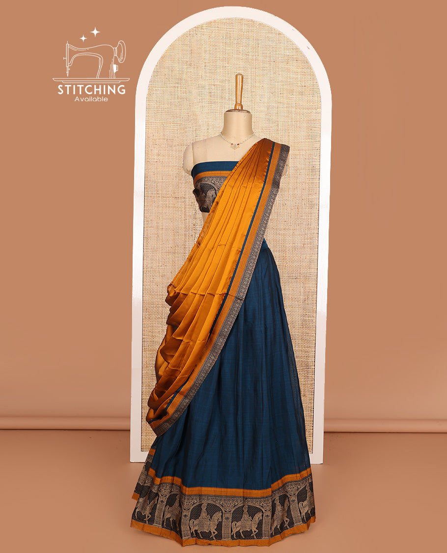 Peacock blue cotton half-saree, plain with contrast man on the horse motifs bordered skirt, matching blouse, and contrast dhavani