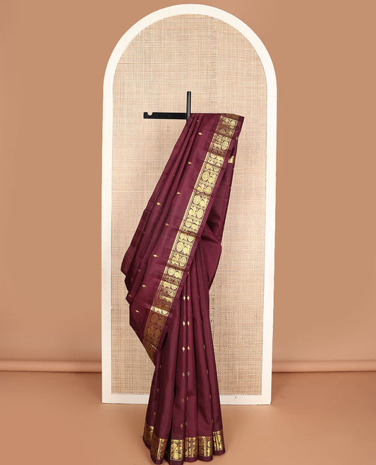 Maroon zari buttas Kanchipuram silksaree, one-sided border of salngai,banaras & annam chakram & zari design pallu