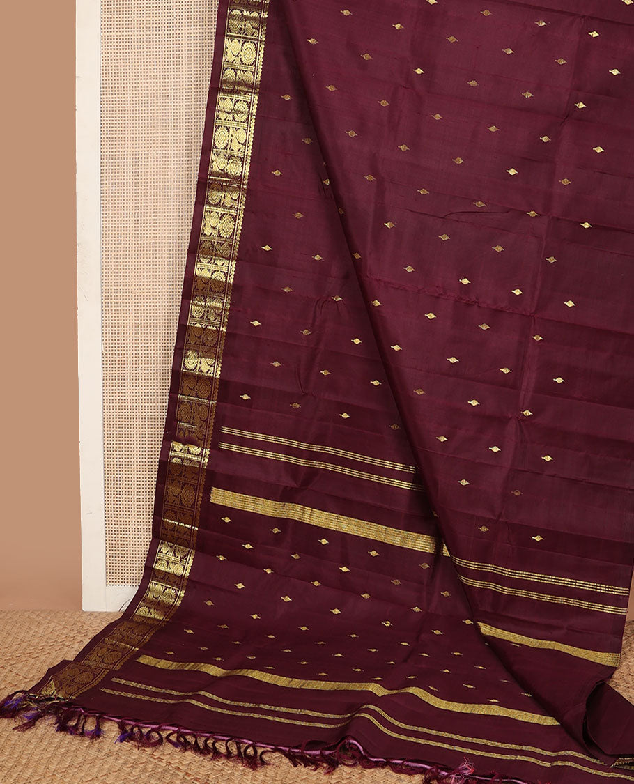Maroon zari buttas Kanchipuram silksaree, one-sided border of salngai,banaras & annam chakram & zari design pallu