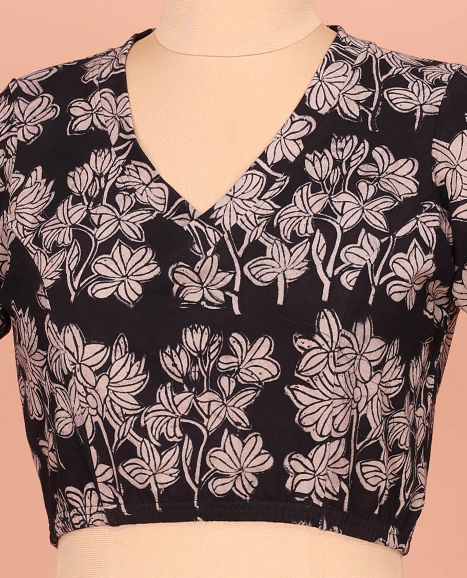 Black Cotton Readymade Blouse Subtly Sparked with All-Over Floral Print, Featuring a Front Leaf-Neck, a Closed Back Neck, and Elbow Sleeves