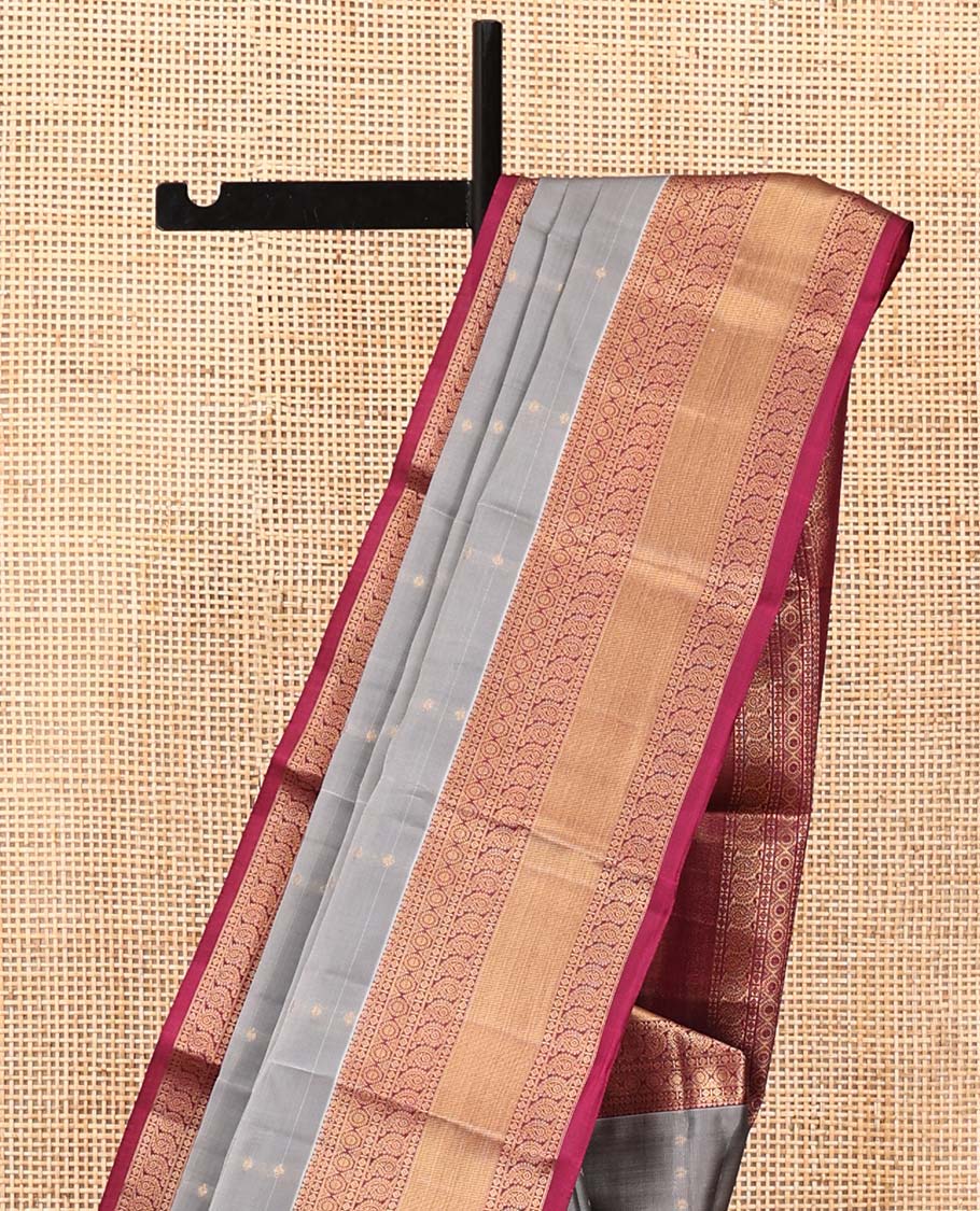 Grey Vasundhara Lite Silk Mix Saree, Subtly Sparkled With Zari Buttas All Over Its Body, Complemented by Contrast Border of Chakram and Manga Designs, Intricately Designed Pallu and Paired with a Contrast Blouse