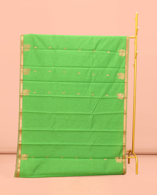 Parrot Green Semi-Silk Cotton Saree, Elegantly Framed with Zari Buttas All Over Its Body, a Subtle Zari Piping Border, Complemented by Contrast Pallu of Peacock Butta Enclosed Checked Design, and Paired with a Contrast Blouse