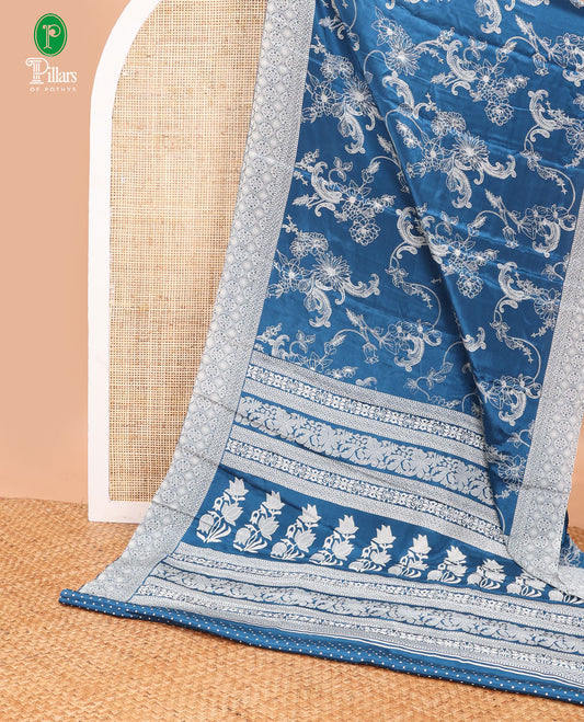 Peacock blue printed turkey crepe sare with printed border & printed pallu along with printed blouse