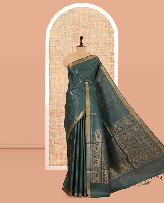 Green Tussar Saree, Mesmerized with Buttas, a Subtle Zari Border, Pallu of Intricate Designs, and a Matching Blouse
