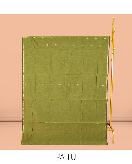 Green Maheshwari Cotton Saree, Beautified with Buttas All Over Its Body, Subtle Zari Piping Border, Complemented by a Contrast Pallu Steeped with Buttas, and Paired with a Contrast Blouse