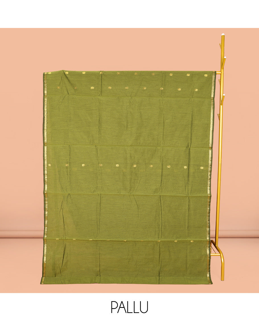 Green Maheshwari Cotton Saree, Beautified with Buttas All Over Its Body, Subtle Zari Piping Border, Complemented by a Contrast Pallu Steeped with Buttas, and Paired with a Contrast Blouse