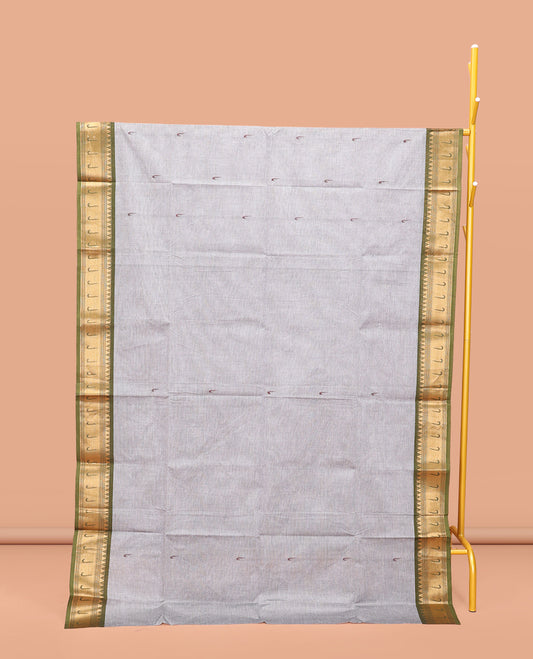 Grey Chettinad Cotton Saree, Steeped with Muniya Buttas On Its Body, Complemented by a Contrast Traditional Muniya Border, Pallu of Stripes, and Paired with a Matching Blouse