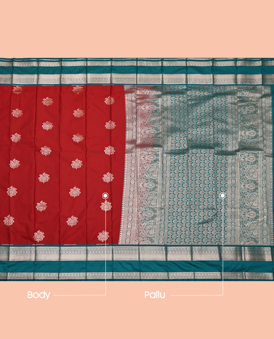 Crimson Red Budget Silk Saree, Richly Detailed with Zari Buttas All Over Its Body, Complemented by a Contrast Traditional Zari Design Rettai Pettu Border, Intricate Pallu, and Paired with a Contrast Blouse