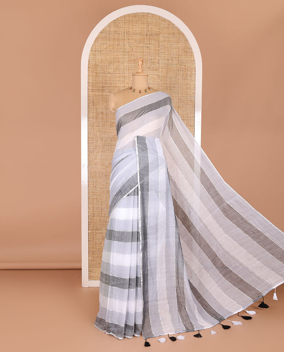 Grey ombre-colored striped khadi mul cotton saree, zari piping border, striped pallu, and a matching striped blouse