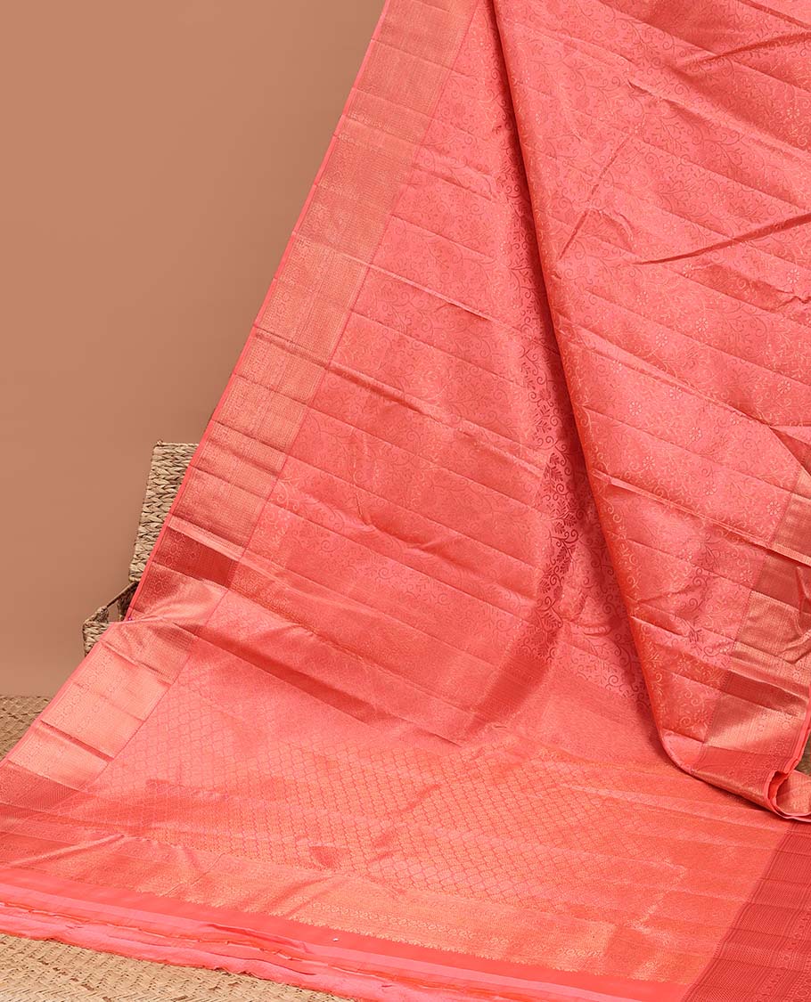Peach floral jacquard kancheepuram silk saree with contrast checked zari border & intricate zari design pallu