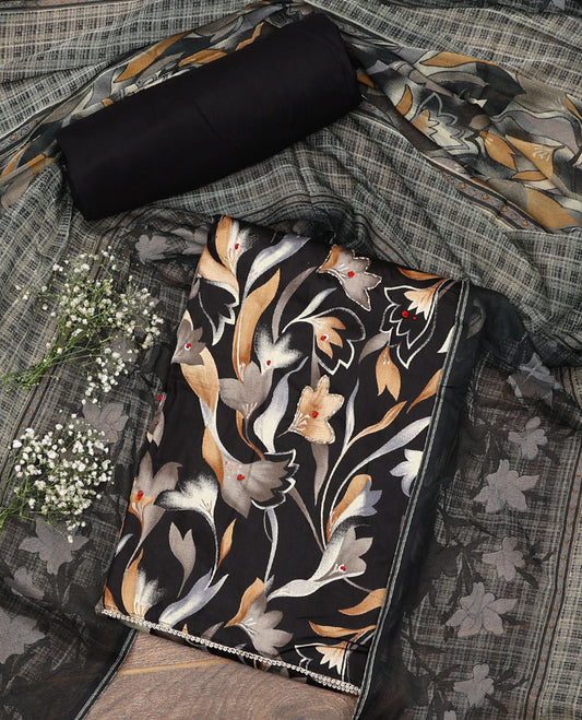 Black material chudidar set, abstract floral print with French knot work top, plain bottom, and dupatta of checks and floral print