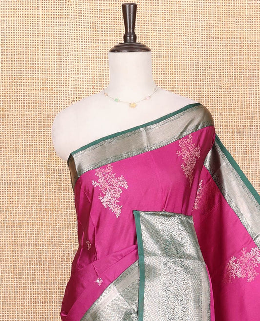 Pink Budget Silk Saree, Embellished with Floral Zari Buttas on Its Body, Complemented by a Contrast Traditional Zari Design Border, Gracefully Embellished Pallu, and Paired with a Contrast Blouse