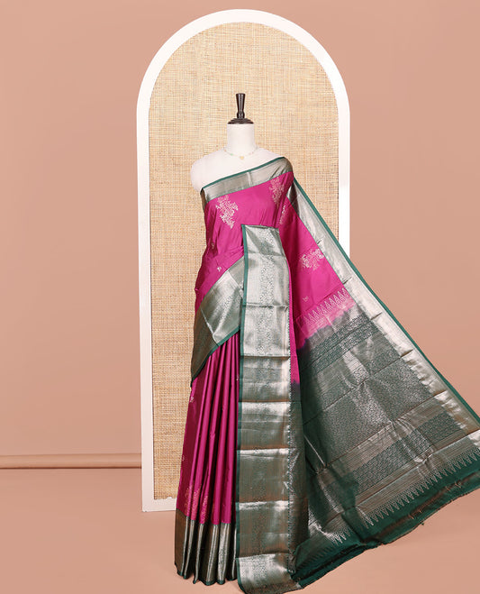 Pink Budget Silk Saree, Embellished with Floral Zari Buttas on Its Body, Complemented by a Contrast Traditional Zari Design Border, Gracefully Embellished Pallu, and Paired with a Contrast Blouse