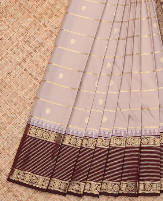 Grey Budget Silk Saree, Embellished with Zari Buttas and Stripes, a Contrast Traditional Zari Border, Grand Pallu, and a Contrast Blouse