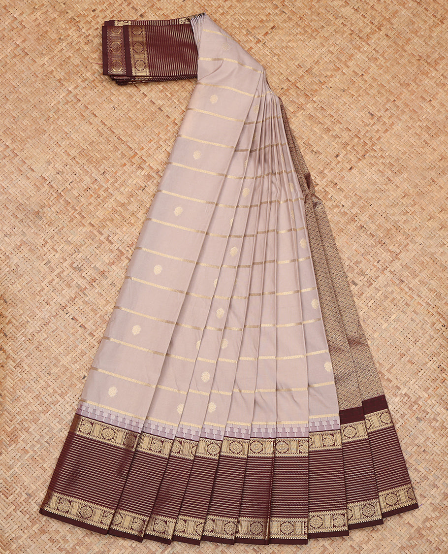 Grey Budget Silk Saree, Embellished with Zari Buttas and Stripes, a Contrast Traditional Zari Border, Grand Pallu, and a Contrast Blouse