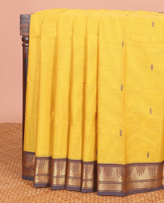 Yellow Chettinad Cotton Saree Subtly Made with Thread Buttas All Over Its Body, Complemented by a Contrast Traditional Zari Temple Border, and a Pallu of Stripes and Buttas