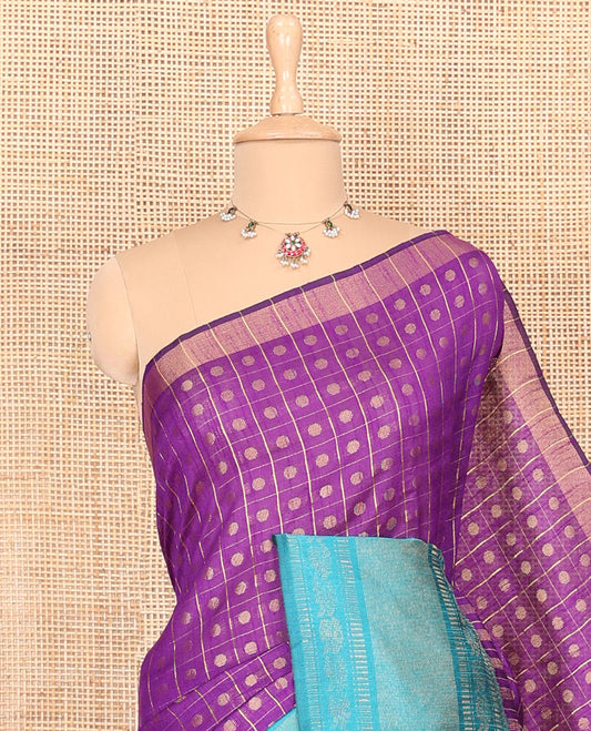 Violet polka dot butta enclosed checked semi-raw silk saree, contrast traditional zari design border, contrast diamond patterned pallu, and a contrast blouse